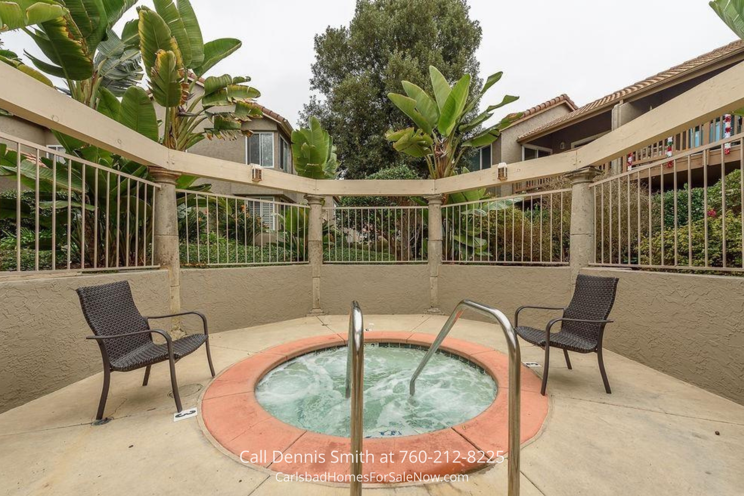 Relaxing outdoor jacuzzi area surrounded by tropical plants, providing a serene retreat at 930 Via Mil Cumbres Unit 175 Solana Beach community.